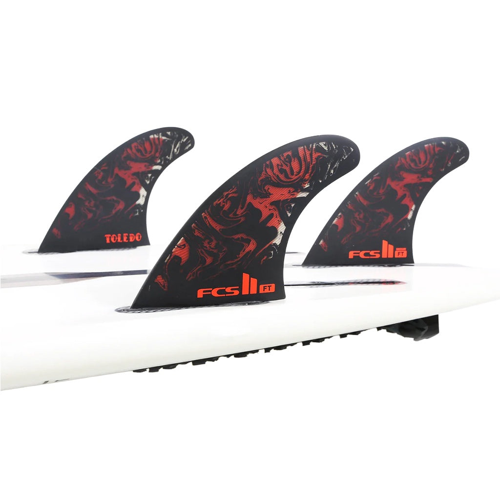 FCS2 x Filipe Toledo | FT Accelerator PC AirCore Grom / X- Small Tri Fin Set. Black/Red