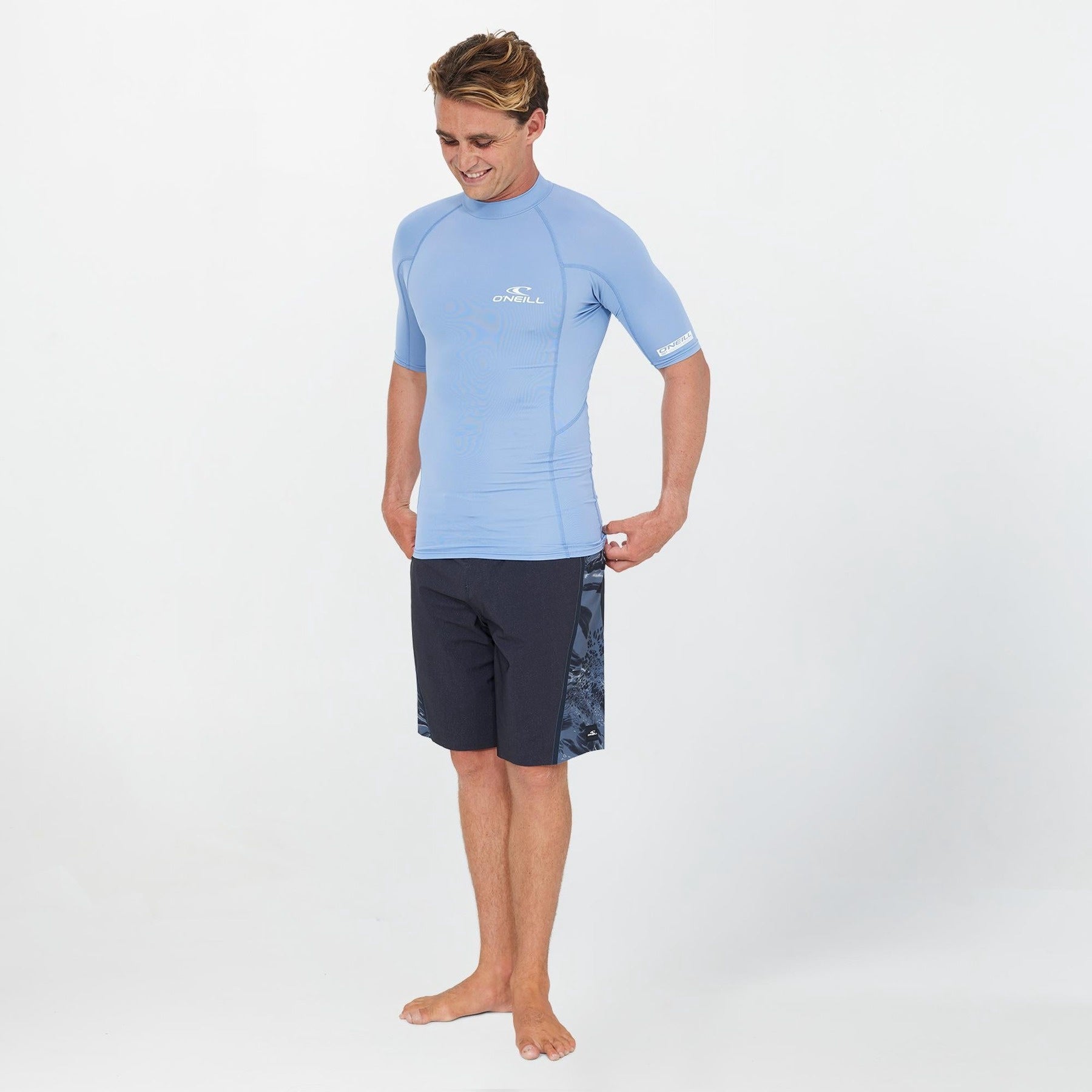 O'Neill | Clean & Mean Short Sleeve Rashguard. Faded Denim